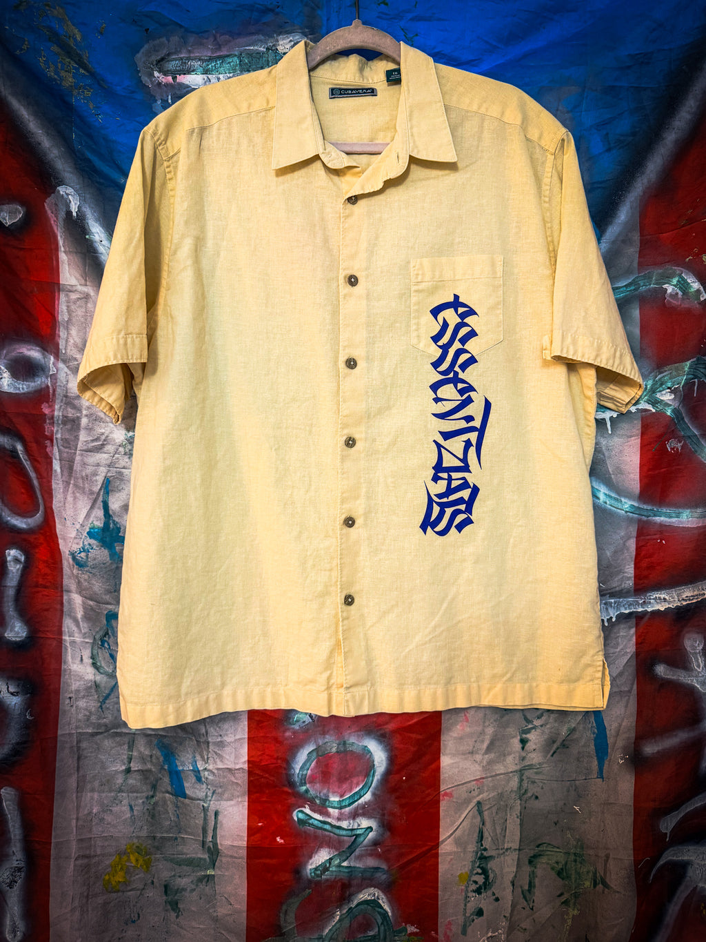 LA CUNA DE LOS ARTISTAS BUTTON UP